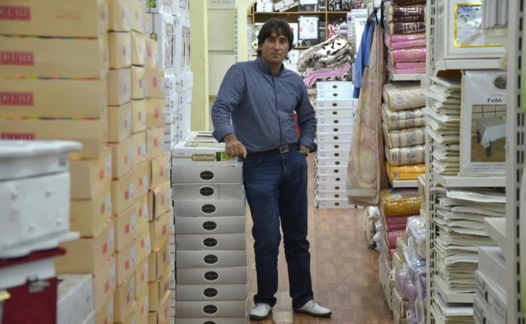 Cuma Ozturk standing next to the products in the Moscow Warehouse